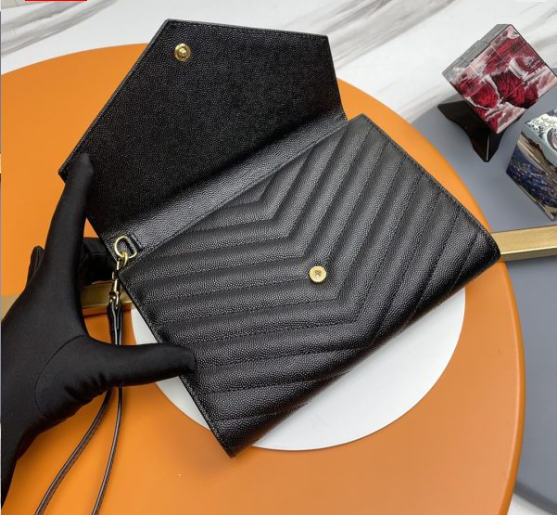 Saint Laurent Cassandre Matelassé Flap Pouch In Quilted Grain De Poudre Embossed Leather 617662